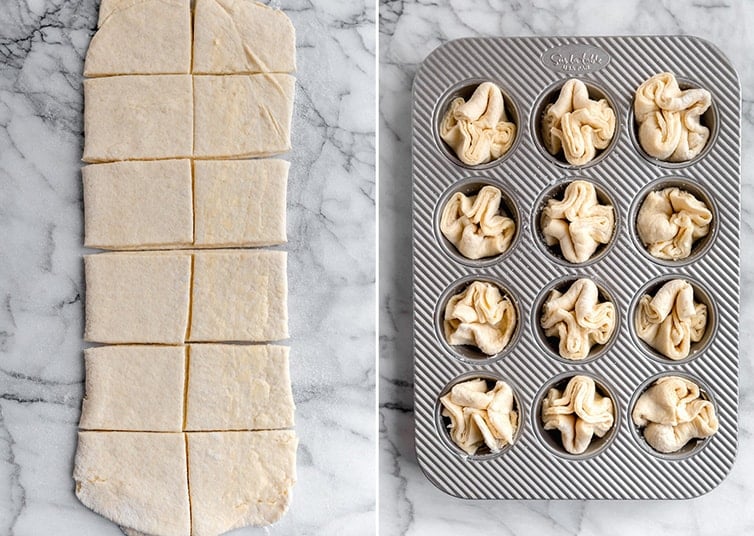 Kouign-mann dough cut into squares, then tucked into a muffin pan.