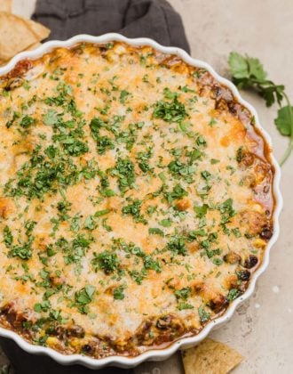 Black bean dip in a shallow white baking dish.