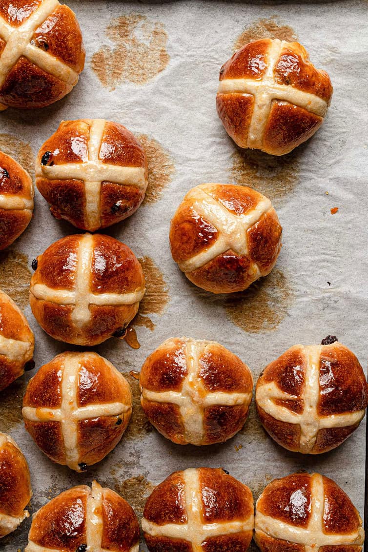 Hot cross buns on a baking sheet.