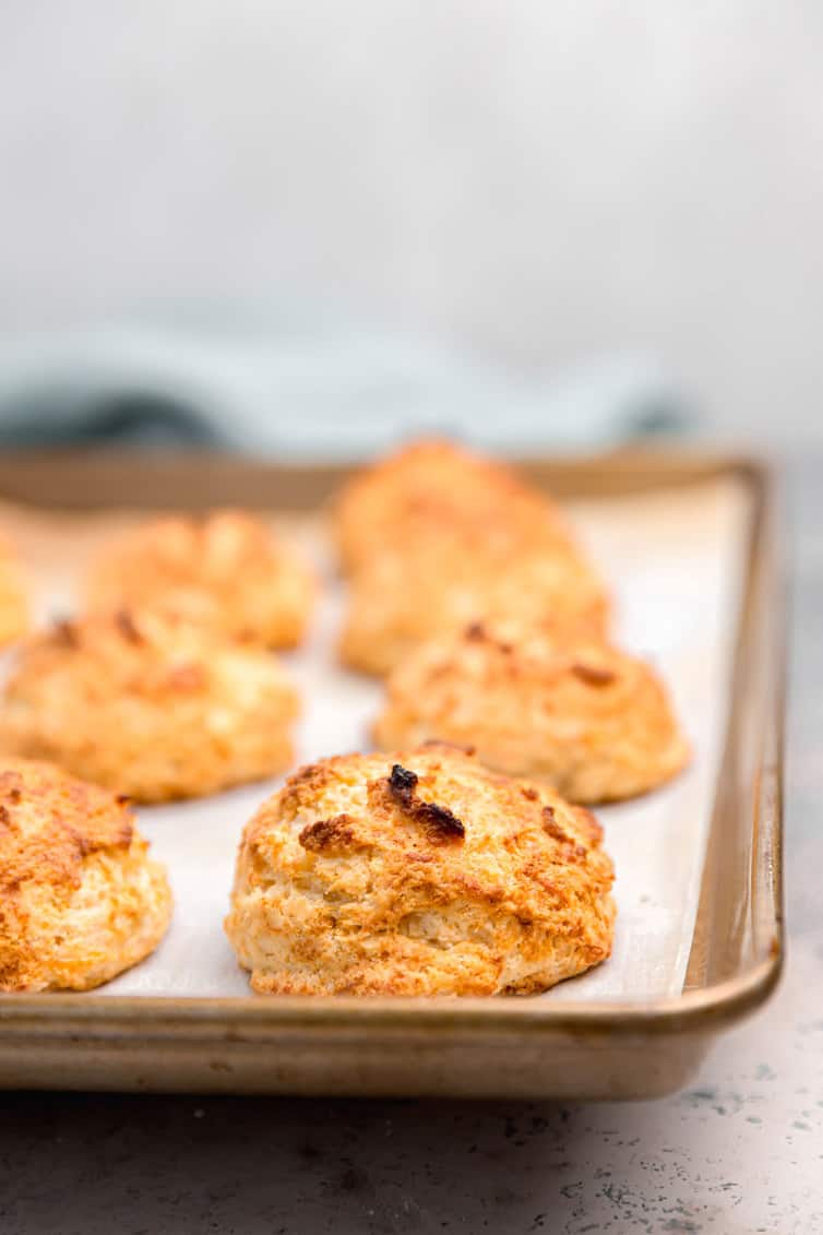 Baked Red Lobster biscuits on a baking sheet.