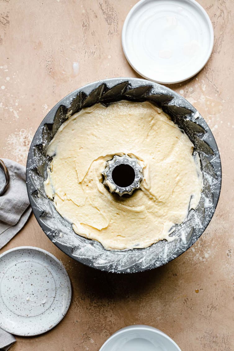 Batter for butter cake in a Bundt pan.