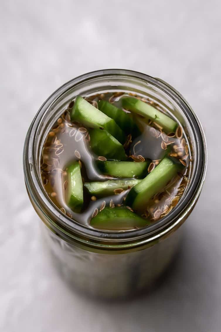 Overhead photo of jar of dil sandwich pickles.