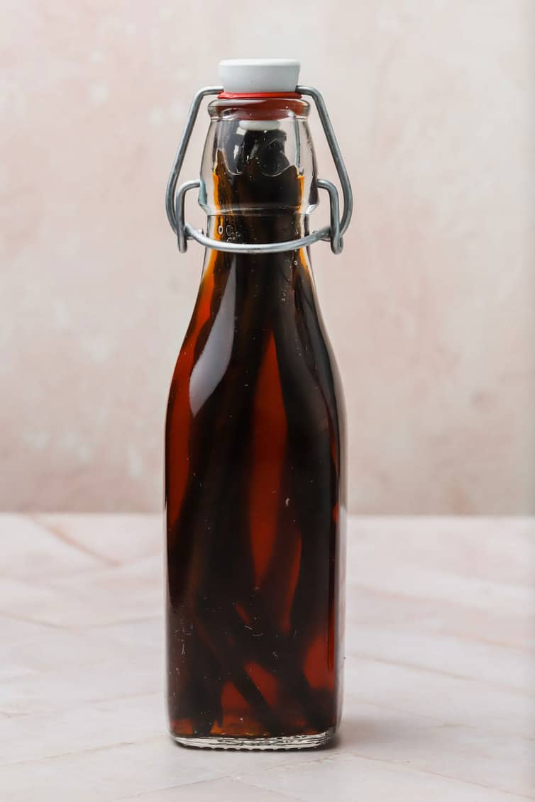 Glass bottle of homemade vanilla extract.