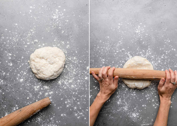 Ball of pie dough on counter being rolled out.