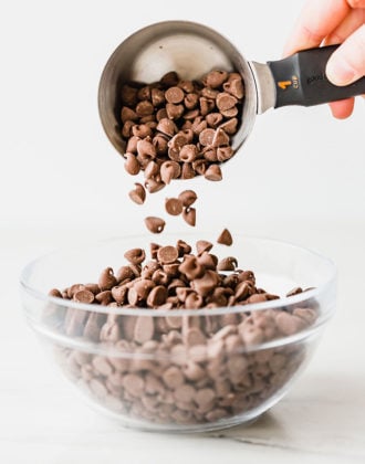 Pouring chocolate chips into a bowl