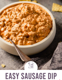 A white bowl of sausage dip with a silver spoon on the left side of the bowl and the words easy sausage dip only 3 ingredients at the bottom.