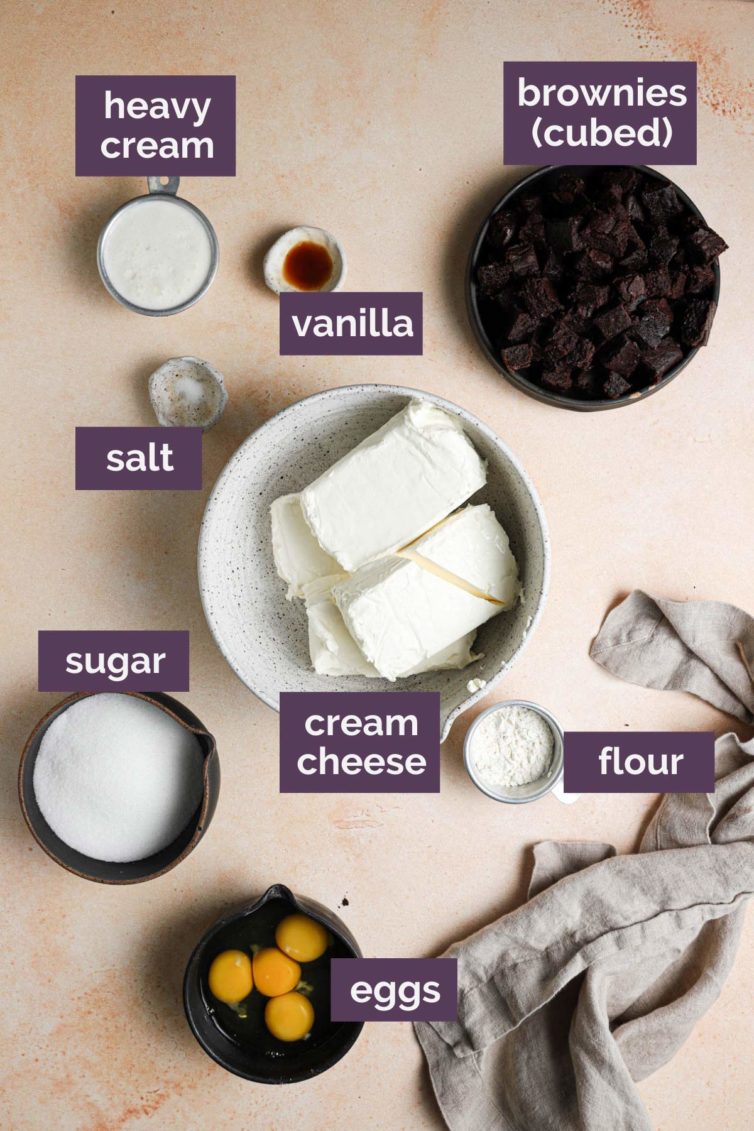 labeled ingredients for this delicious brownie cheesecake recipe