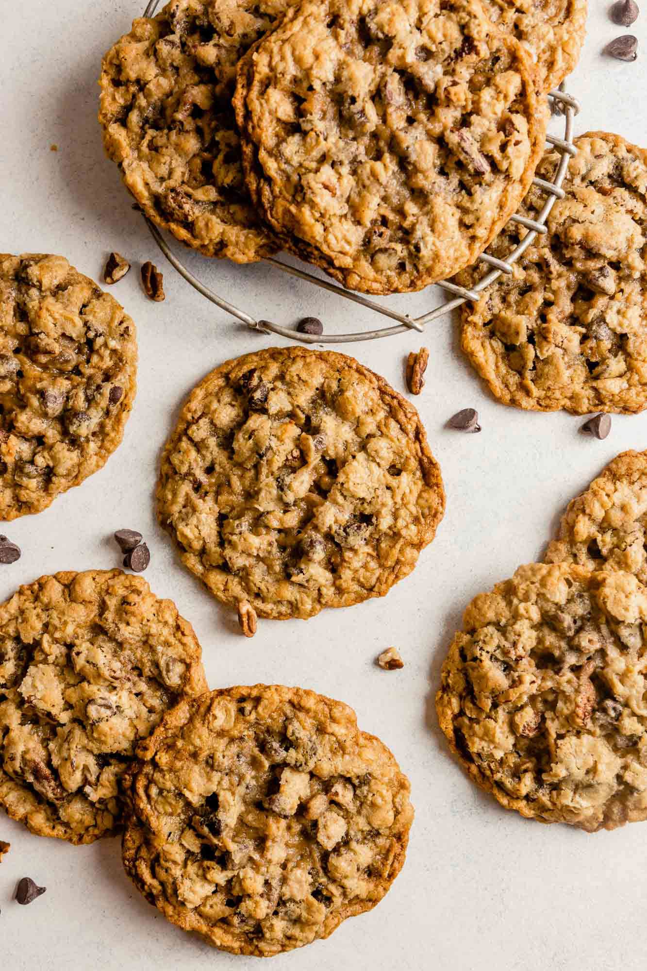 Overhead photo of cowboy cookies spread out on a counter.