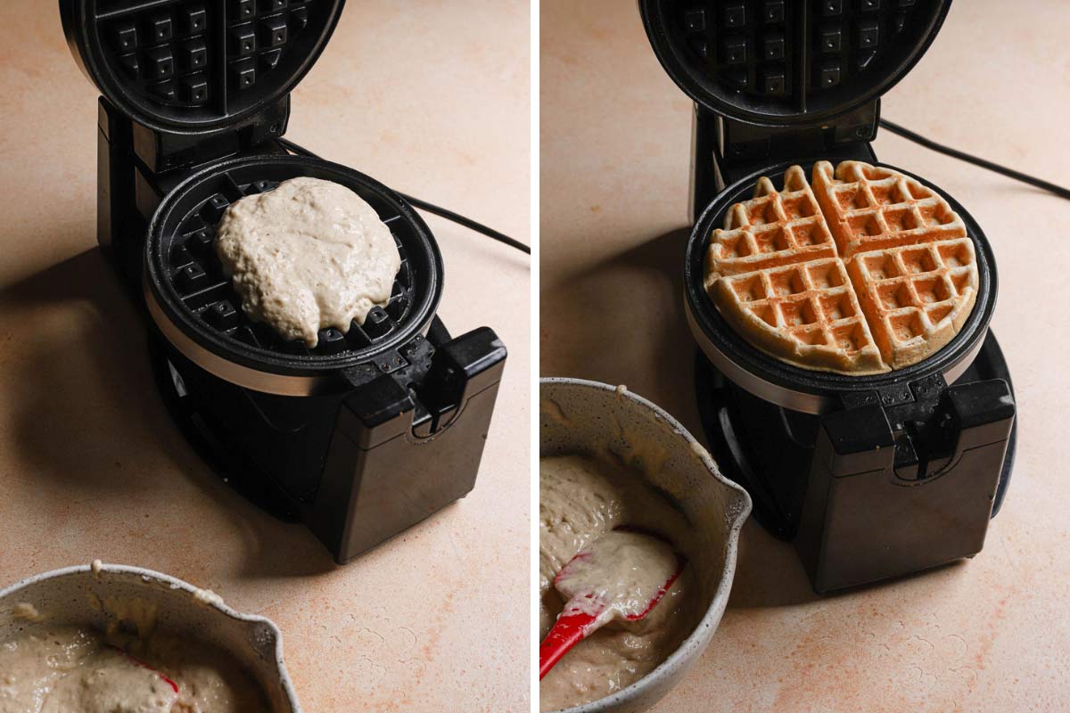 Belgian waffles cooking on a waffle iron.